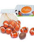 Madelaine Foiled Milk Chocolate Sports Balls 2-Ounce Mesh Bags - Football: 24-Piece Tub - Candy Warehouse