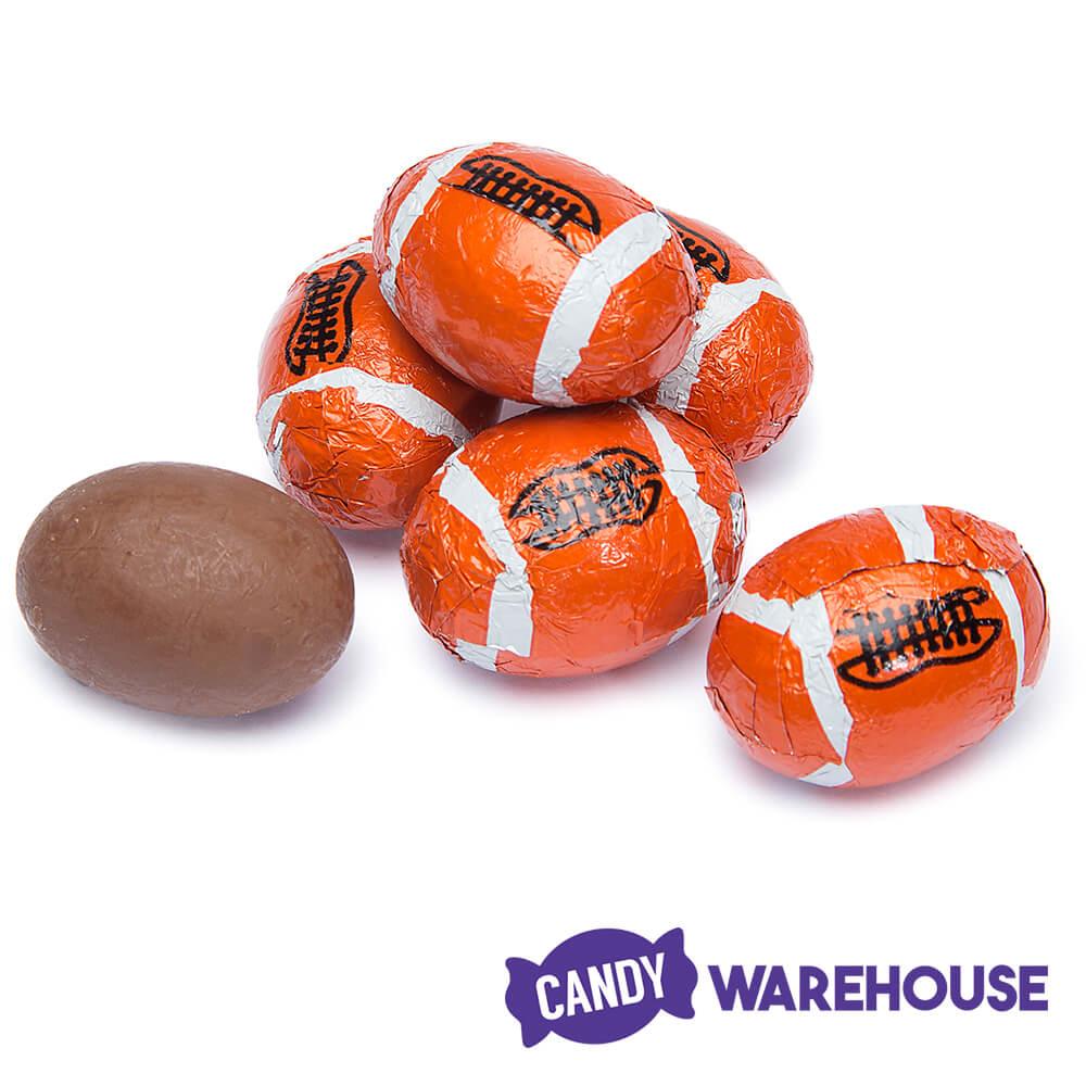 Madelaine Foiled Milk Chocolate Sports Balls 2-Ounce Mesh Bags - Football: 24-Piece Tub - Candy Warehouse