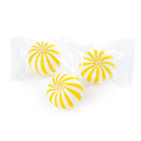 YumJunkie Sassy Spheres Banana Yellow Striped Candy Balls: 5LB Bag - Candy Warehouse